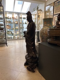 An exceptionally large Chinese silver-inlaid bronze figure of Guanyin, Yutang Shi Sou mark, Qing