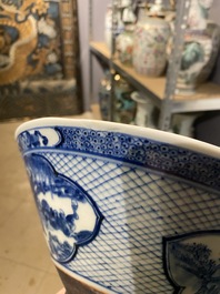 A pair of Chinese blue and white bowls and a famille verte vase, 19th C.