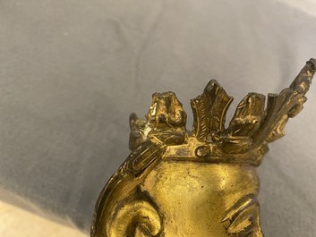 Een Chinese vergulde bronzen figuur van een zittende Boeddha, Ming