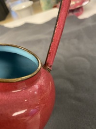 A Chinese ruby-ground Canton enamel teapot and a pair of covered bowls, Qianlong/Jiaqing