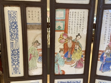 A Chinese five-fold wooden screen with famille rose plaques, 19th C.