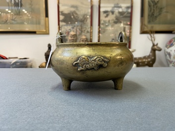 A Chinese bronze tripod 'elephants' censer, Qing