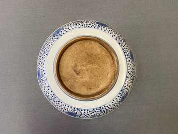 A Chinese blue and white 'lotus bouquet' dish, Qianlong/Jiaqing