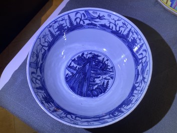 Un bol en porcelaine de Chine en bleu et blanc &agrave; d&eacute;cor d'un paysage, Wanli