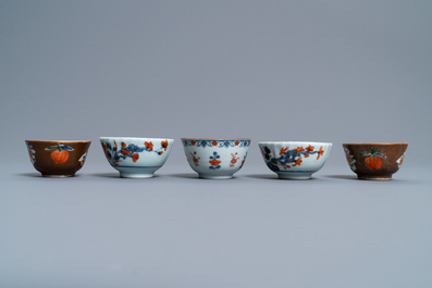 A Chinese Imari-style porringer, a mug, a bowl and five cups and saucers, Kangxi/Qianlong