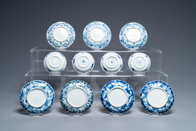 Nineteen Chinese blue and white saucers and twelve cups, Kangxi