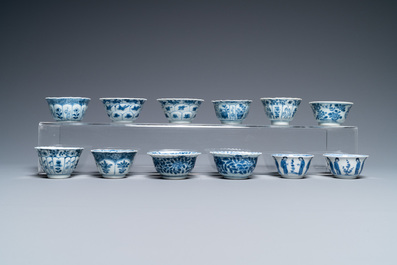 Nineteen Chinese blue and white saucers and twelve cups, Kangxi