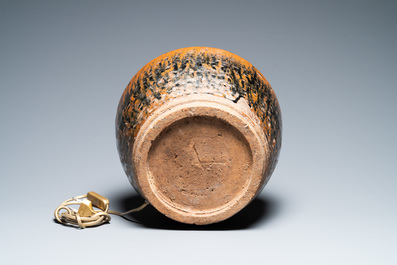 A Chinese brown-spotted black-glazed jar transformed into a lamp, Song