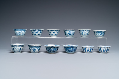 Nineteen Chinese blue and white saucers and twelve cups, Kangxi