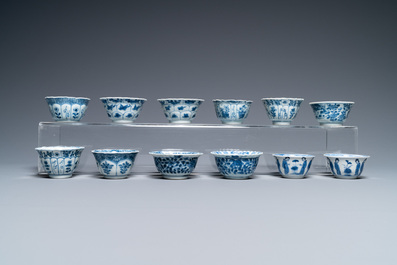 Nineteen Chinese blue and white saucers and twelve cups, Kangxi