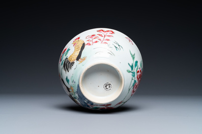 A varied collection of Chinese famille rose and grisaille cups and saucers and a 'rooster' bowl, Yongzheng/Qianlong