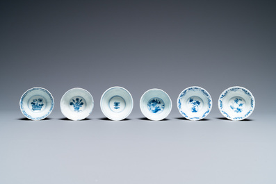 Nineteen Chinese blue and white saucers and twelve cups, Kangxi