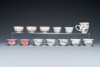 A varied collection of Chinese famille rose and grisaille cups and saucers and a 'rooster' bowl, Yongzheng/Qianlong