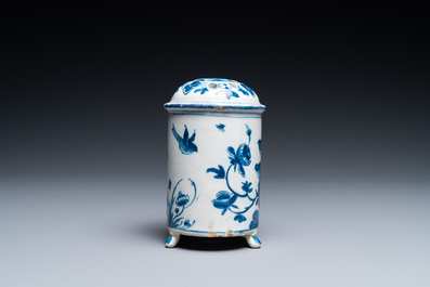 A Dutch Delft blue and white tripod caster with birds near blossoms, 1st half 18th C.