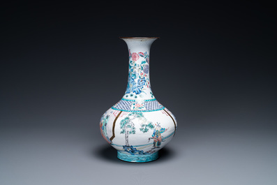 A Chinese Canton enamel bottle vase, Qianlong mark, 19th C.