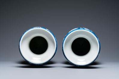 A pair of Chinese blue and white 'dragon and peony' vases, 19th C.