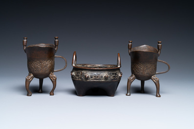 Two Chinese small bronze 'jue' ewers and a tripod censer, probably Yuan