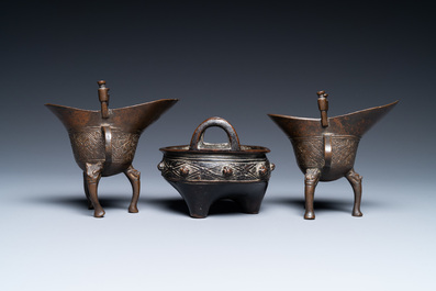 Two Chinese small bronze 'jue' ewers and a tripod censer, probably Yuan