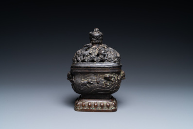 A Chinese bronze 'mythical beasts' censer and cover, 17th C.