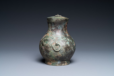 A Chinese bronze 'hu' vase and cover, Han