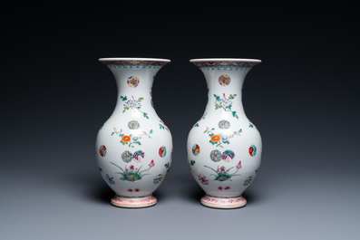 A pair of Chinese famille rose vases, Yongzheng mark, 19/20th C.