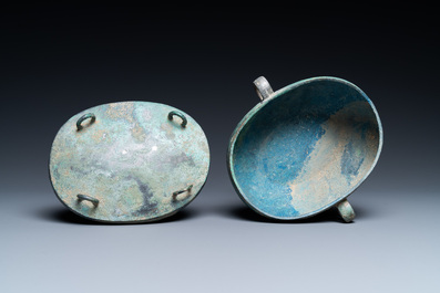 A Chinese archaic bronze 'zhou' bowl and cover, Spring and Autumn period