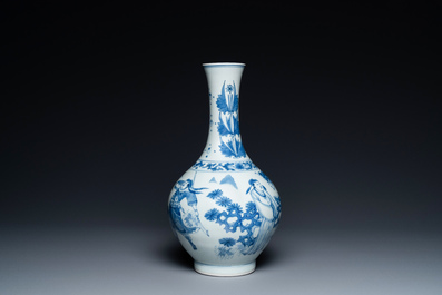 A Chinese blue and white bottle vase depicting four figures, Transitional period