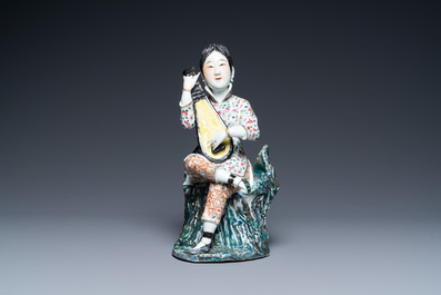 A Chinese famille rose figure of a musician, Fu Jian Hui Guan mark, Republic