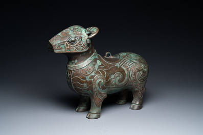 A Chinese ram-shaped silver-inlaid bronze 'xizun' vessel, Ming