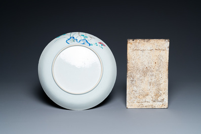 A Chinese famille rose dish and a qianjiang cai plaque signed Wang Ziqing mounted as a screen, Yongzheng and Republic