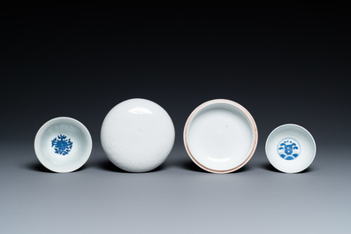 A Chinese white-glazed bowl, a small blue and white bowl and a covered box with incised design, Ming and Qing