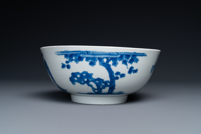 A Chinese blue and white bowl and a pair of cups and saucers, Kangxi