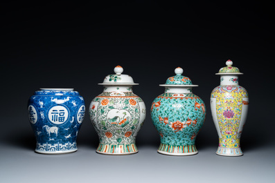 Four various Chinese famille rose, verte and blue and white vases, 19/20th C.