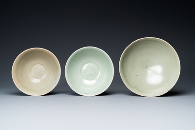 Three Chinese celadon-glazed 'lotus' bowls, Song