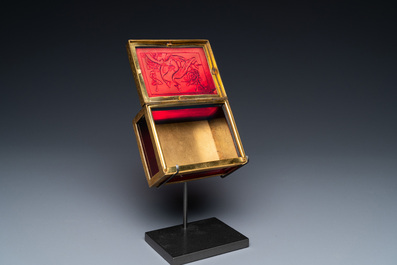 A Chinese gilt-copper box set with glass plaques, Beijing Imperial workshops, Qianlong