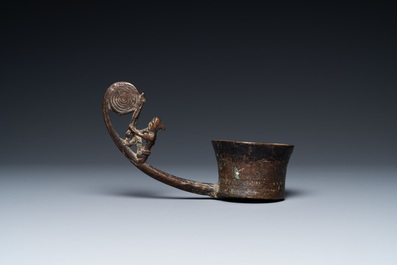 A Vietnamese bronze ladle depicting a musician, Dong Son, ca. 5th/2nd C. BC