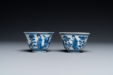 A Chinese blue and white bowl and a pair of cups and saucers, Kangxi