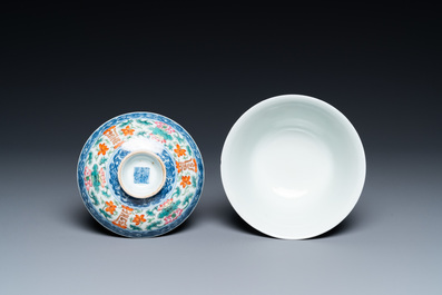 A Chinese famille rose bowl and cover, a 'dragon' plate and a celadon plate, 19th C.