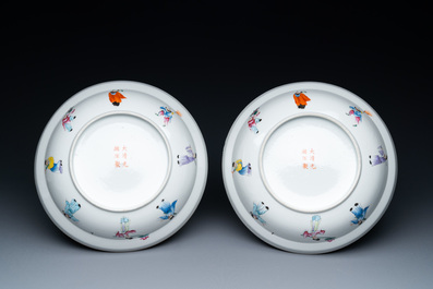 A pair of Chinese famille rose bowls and covers, Guangxu mark and of the period