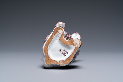 A Brussels faience manganese and white dog, 18th C.