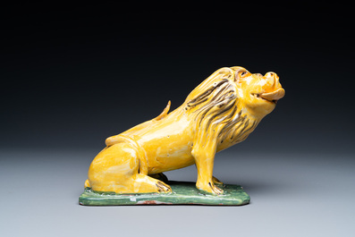 A polychrome Brussels faience model of a lion of Brabant, dated 1788