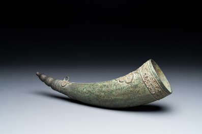 A Vietnamese bronze 'Oliphant' horn or rhyton, L&ecirc; or Mạc dynasty, 15/16th C.