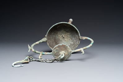 A Vietnamese bronze oil lamp with complete suspension chain, Dong Son, ca. 3rd/1st C. BC