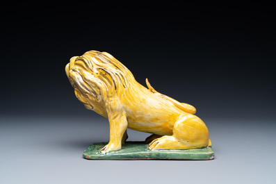 A polychrome Brussels faience model of a lion of Brabant, dated 1788