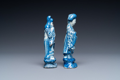 Two Dutch Delft blue and white figures of a Chinese man and woman, 1st quarter 18th C.