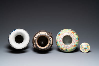 Two Chinese Nanking crackle-glazed vases and a yellow-ground famille rose 'butterflies' jar and cover, 19th C.