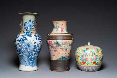 Two Chinese Nanking crackle-glazed vases and a yellow-ground famille rose 'butterflies' jar and cover, 19th C.