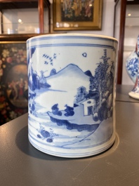 A Chinese blue and white brush pot with a landscape and antiquities, Kangxi