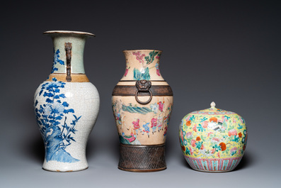 Two Chinese Nanking crackle-glazed vases and a yellow-ground famille rose 'butterflies' jar and cover, 19th C.