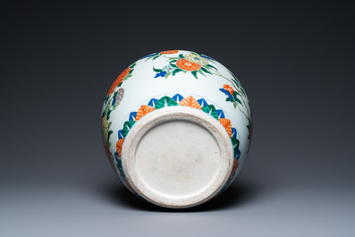 A Chinese wucai vase with floral design, 19th C.